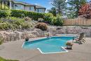 1003 Skeena Drive, Kelowna, BC  - Outdoor With In Ground Pool With Backyard 