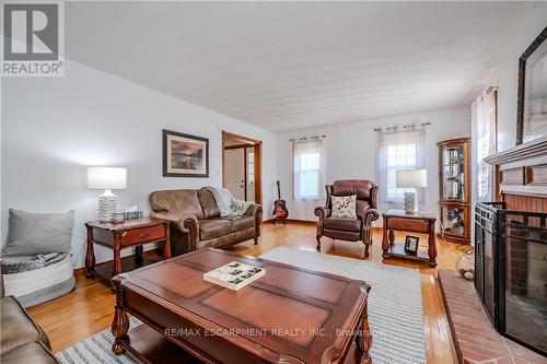 1930 West River Road, North Dumfries, ON - Indoor Photo Showing Living Room With Fireplace