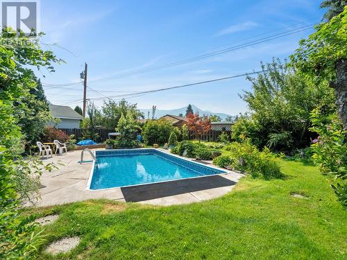 1150 Marianna  Crescent, Trail, BC - Outdoor With In Ground Pool With Backyard