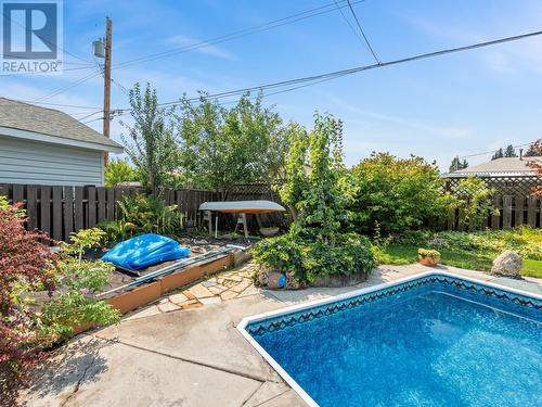 1150 Marianna  Crescent, Trail, BC - Outdoor With In Ground Pool With Backyard