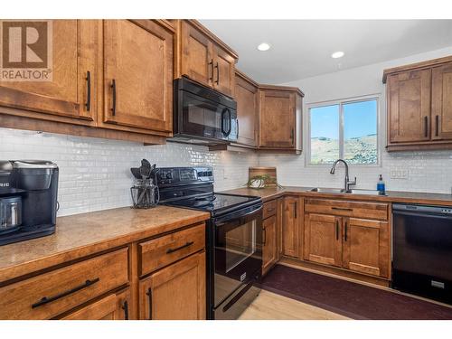 7005 Longacre Drive, Vernon, BC - Indoor Photo Showing Kitchen With Double Sink