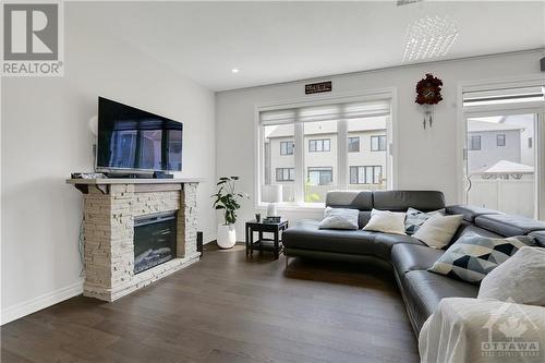 402 Cope Drive, Ottawa, ON - Indoor Photo Showing Living Room With Fireplace