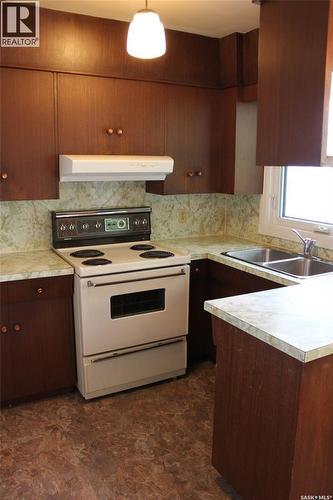 310 1St Avenue W, Canora, SK - Indoor Photo Showing Kitchen With Double Sink