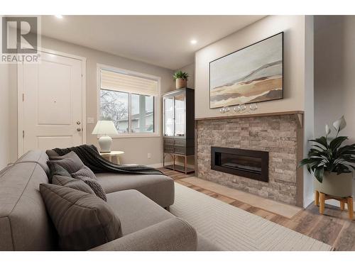 5830 Okanagan Street Unit# 103, Oliver, BC - Indoor Photo Showing Living Room With Fireplace