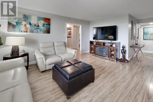 605 - 1881 Jane Street, Toronto (Maple Leaf), ON - Indoor Photo Showing Living Room