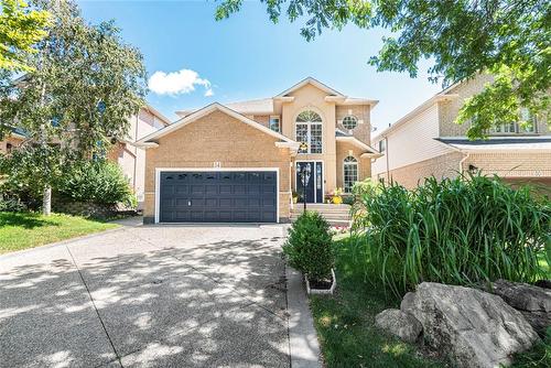 great curb appeal with fresh driveway and gardens - 54 Stonepine Crescent, Hamilton, ON - Outdoor