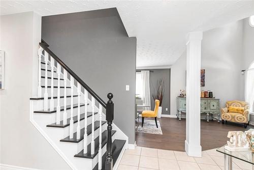 professionally refinished staircase - 54 Stonepine Crescent, Hamilton, ON - Indoor Photo Showing Other Room