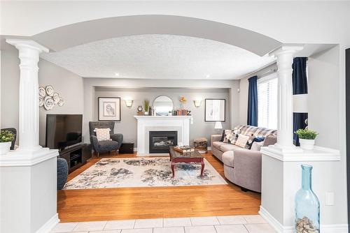 bright and roomy - 54 Stonepine Crescent, Hamilton, ON - Indoor Photo Showing Living Room With Fireplace