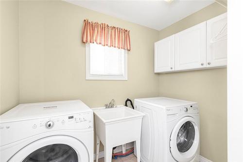 large main floor laundry room - 54 Stonepine Crescent, Hamilton, ON - Indoor Photo Showing Laundry Room