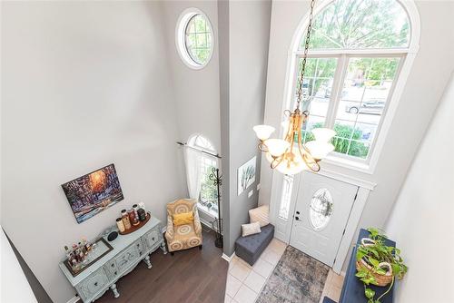 upper hallway view of foyer below - 54 Stonepine Crescent, Hamilton, ON - Indoor Photo Showing Other Room