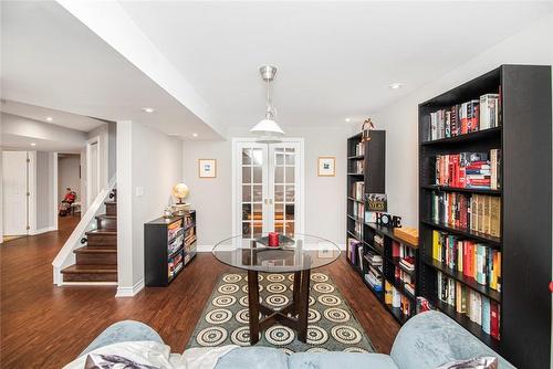 new luxury vinyl plank flooring throughout basement - 54 Stonepine Crescent, Hamilton, ON - Indoor Photo Showing Other Room