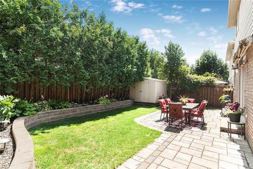 private backyard with large storage shed - 54 Stonepine Crescent, Hamilton, ON - Outdoor With Deck Patio Veranda