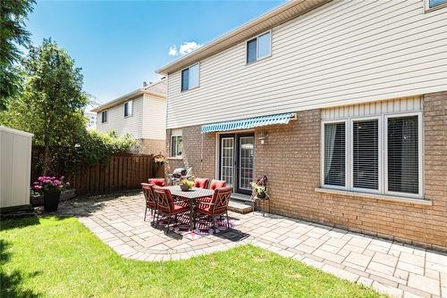 interlocking patio with awning - 54 Stonepine Crescent, Hamilton, ON - Outdoor With Exterior