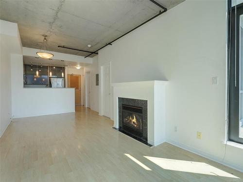 605-860 View St, Victoria, BC - Indoor Photo Showing Other Room With Fireplace