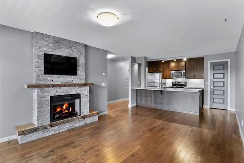 306-1777 Water Street, Kelowna, BC - Indoor With Fireplace