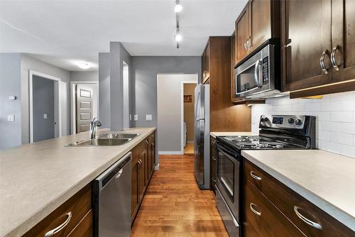 306-1777 Water Street, Kelowna, BC - Indoor Photo Showing Kitchen With Stainless Steel Kitchen With Double Sink With Upgraded Kitchen