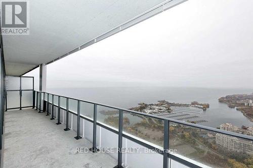 5709 - 30 Shore Breeze Drive, Toronto (Mimico), ON - Outdoor With Body Of Water With Balcony With View With Exterior