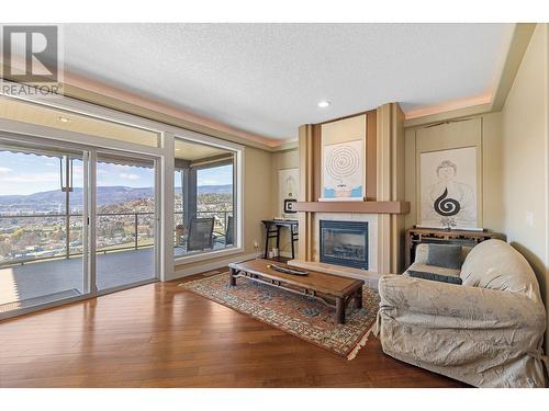 766 Denali Drive, Kelowna, BC - Indoor Photo Showing Living Room With Fireplace