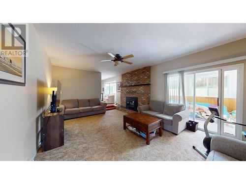 891 Funn Street, Quesnel, BC - Indoor Photo Showing Living Room With Fireplace