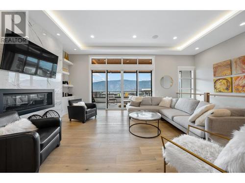 9443 Ledgestone Road, Lake Country, BC - Indoor Photo Showing Living Room With Fireplace