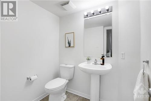 Powder room on main level - 202 Chapman Mills Drive, Ottawa, ON - Indoor Photo Showing Bathroom