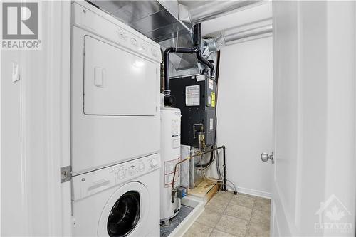 Laundry on upper level and storage closet! - 202 Chapman Mills Drive, Ottawa, ON - Indoor Photo Showing Laundry Room