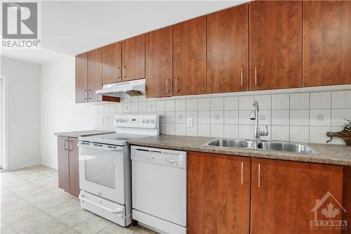 202 Chapman Mills Drive, Ottawa, ON - Indoor Photo Showing Kitchen With Double Sink