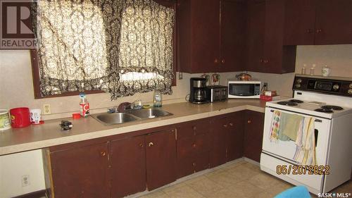 1017 23Rd Street W, Saskatoon, SK - Indoor Photo Showing Kitchen With Double Sink