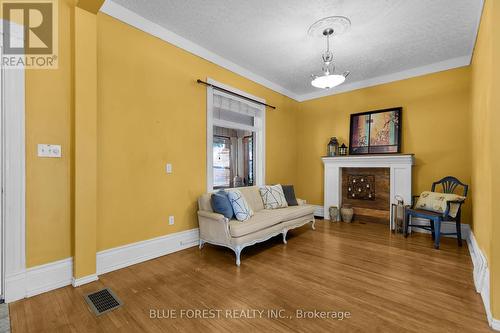 48 Josephine Street, London, ON - Indoor Photo Showing Other Room With Fireplace