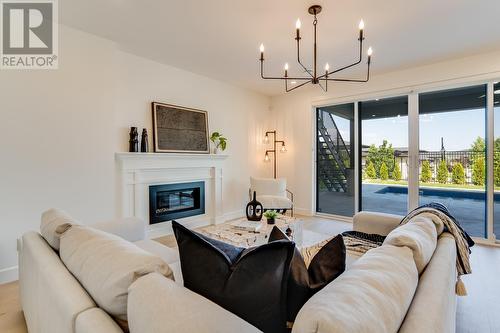 4956 Bucktail Lane, Kelowna, BC - Indoor Photo Showing Living Room With Fireplace