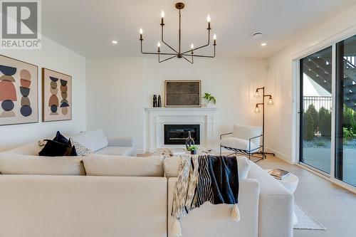 4956 Bucktail Lane, Kelowna, BC - Indoor Photo Showing Living Room With Fireplace