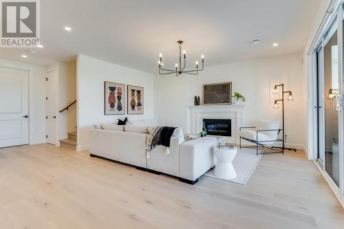 4956 Bucktail Lane, Kelowna, BC - Indoor Photo Showing Living Room With Fireplace