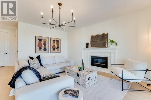 4956 Bucktail Lane, Kelowna, BC - Indoor Photo Showing Living Room With Fireplace