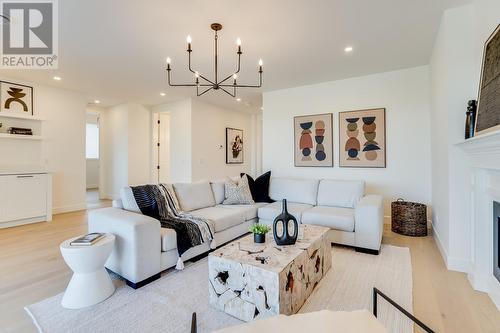 4956 Bucktail Lane, Kelowna, BC - Indoor Photo Showing Living Room With Fireplace