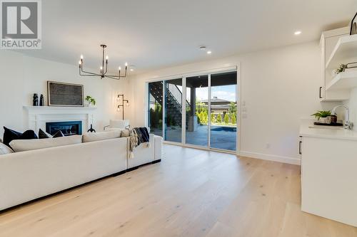 4956 Bucktail Lane, Kelowna, BC - Indoor Photo Showing Living Room With Fireplace