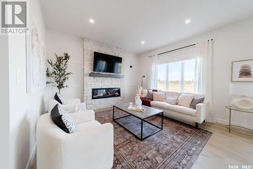 151 Doran Way, Saskatoon, SK - Indoor Photo Showing Living Room With Fireplace