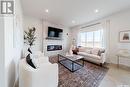 151 Doran Way, Saskatoon, SK  - Indoor Photo Showing Living Room With Fireplace 