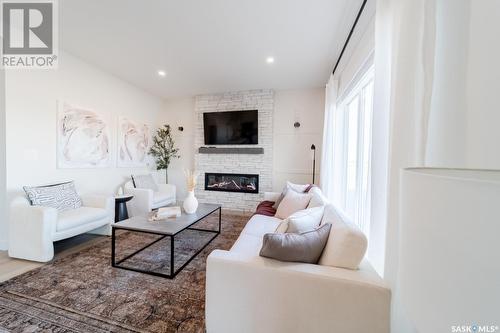 151 Doran Way, Saskatoon, SK - Indoor Photo Showing Living Room With Fireplace