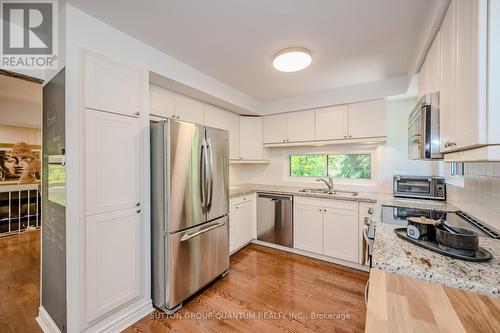 1 - 1250 Marlborough Court, Oakville (College Park), ON - Indoor Photo Showing Kitchen With Stainless Steel Kitchen With Double Sink