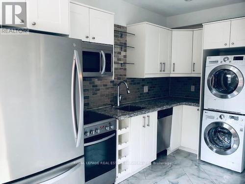 Main Fl - 291 Roncesvalles Avenue, Toronto (Roncesvalles), ON - Indoor Photo Showing Laundry Room