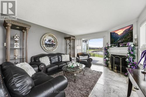 491-493 Dewitt Road, Hamilton (Lakeshore), ON - Indoor Photo Showing Living Room With Fireplace