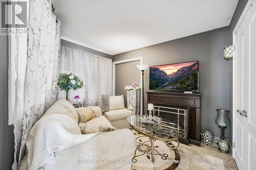 491-493 Dewitt Road, Hamilton (Lakeshore), ON - Indoor Photo Showing Living Room With Fireplace