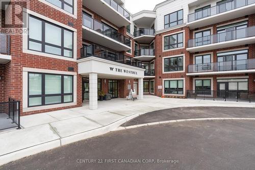 201 - 1975 Fountain Grass Drive, London, ON - Outdoor With Balcony With Facade