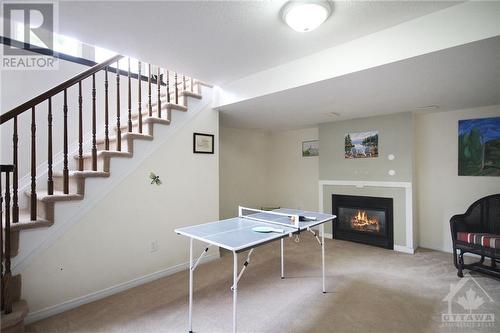 105 Rustwood Private, Ottawa, ON - Indoor Photo Showing Other Room With Fireplace