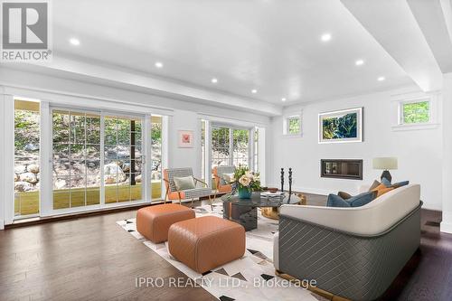 39 Todholm Drive, Muskoka Lakes, ON - Indoor Photo Showing Living Room With Fireplace