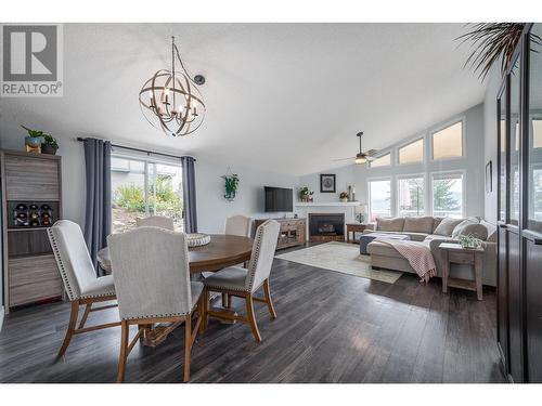 3138 Shetler Drive, West Kelowna, BC - Indoor Photo Showing Dining Room With Fireplace