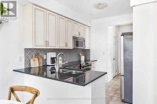 2037 Trawden Way, Oakville (Palermo West), ON - Indoor Photo Showing Kitchen With Double Sink