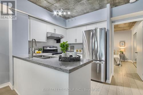 1508 - 22 Wellesley Street E, Toronto (Church-Yonge Corridor), ON - Indoor Photo Showing Kitchen With Stainless Steel Kitchen With Double Sink With Upgraded Kitchen