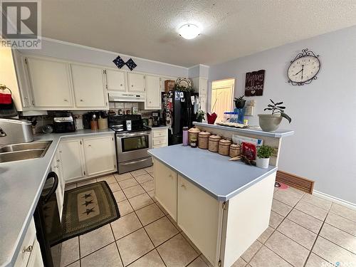 143 Memorial Drive, Spiritwood, SK - Indoor Photo Showing Kitchen With Double Sink