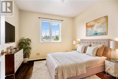 This image has been virtually staged. - 18 Drumso Street, Ottawa, ON - Indoor Photo Showing Bedroom